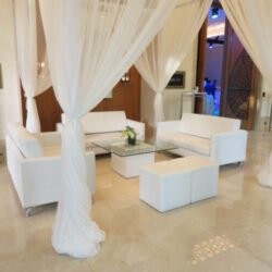 Le-Minou-Square-Glass-Coffee-Table-with-Sophie-3-Seaters-and-Roma-Square-Pouffes-1-scaled-e1643972145810